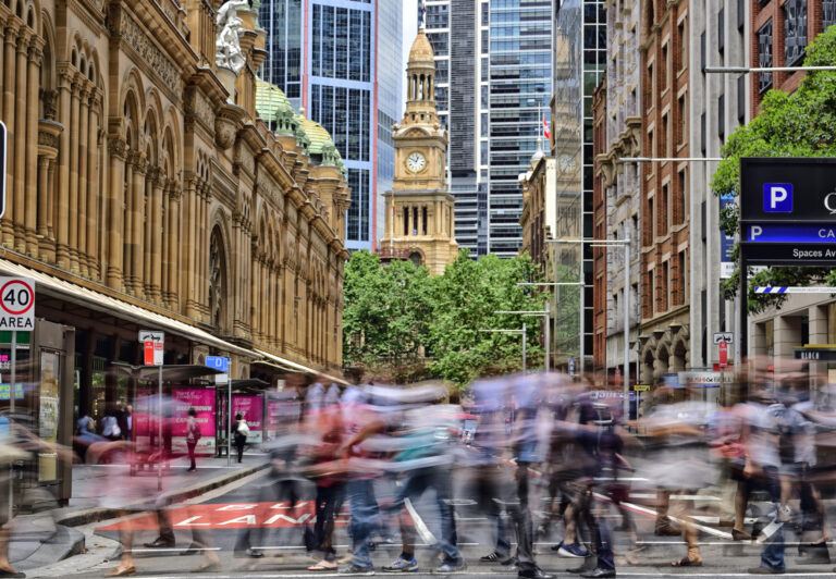 People Crowd Crossing Street In Central Sydney