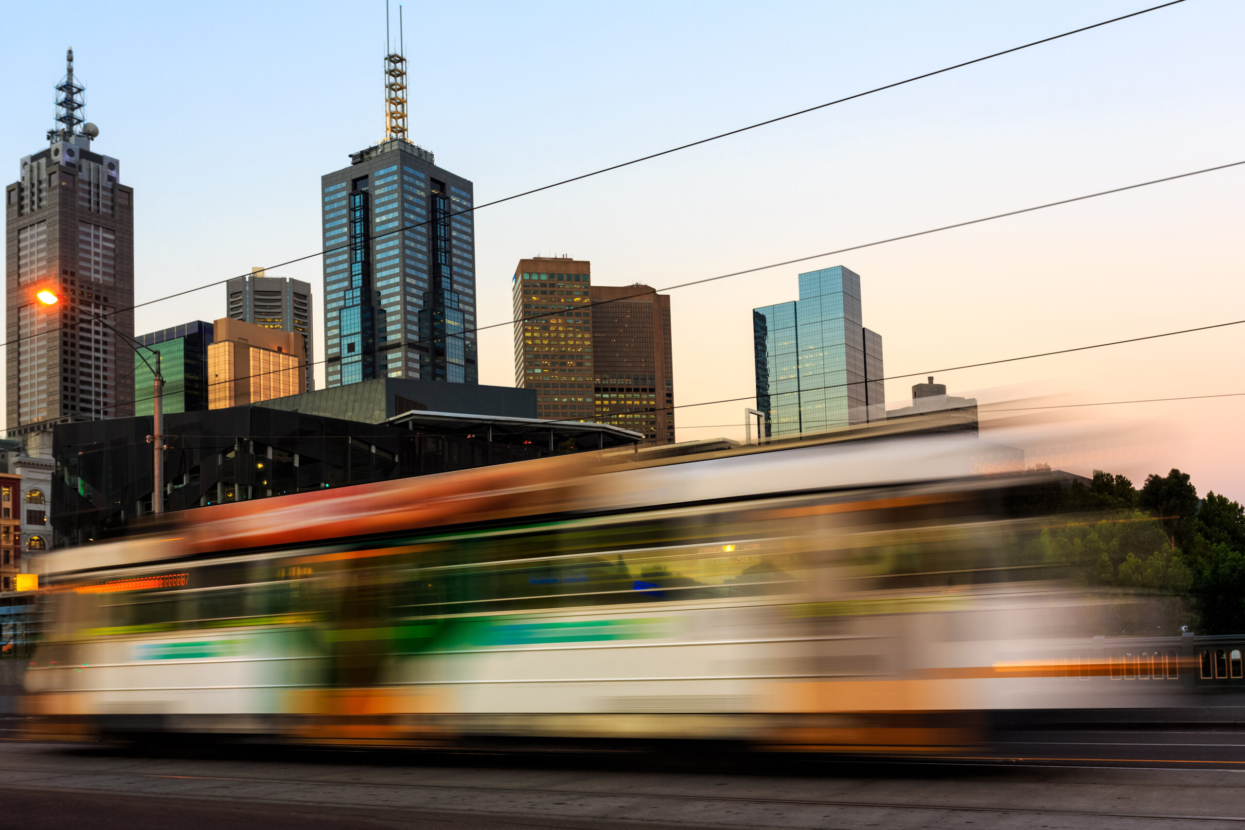 Tram In Motion At Sunset, City Of Melbourne, Australia